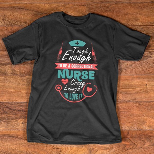 The design is a women's t-shirt with the text "Tough Enough to be a Correctional Nurse" in blue text and an image of a heartbeat and a red stethoscope. The text "Tough Enough to be a Correctional Nurse" suggests that being a correctional nurse is a challenging and demanding job that requires toughness and resilience. Correctional nurses work in correctional facilities such as jails and prisons, and they are responsible for providing medical care to inmates who often have complex and serious medical needs. The image of the heartbeat and red stethoscope is a common symbol of healthcare and medical professionals. The red stethoscope could symbolize the intensity and passion that a correctional nurse brings to their work. Overall, this design represents the idea that being a correctional nurse is a challenging and important job that requires toughness and resilience. It acknowledges the difficult and sometimes dangerous working conditions that correctional nurses face, and it celebrates their dedication and hard work in providing medical care to those in need.